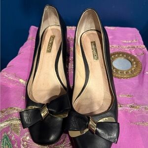 Louise et Cie Black Heels with Gold Bow Accent